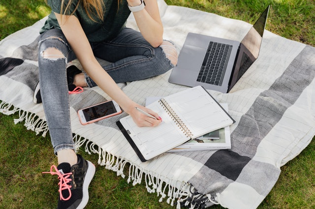 Woman writing badass documentation for their README Github projects.